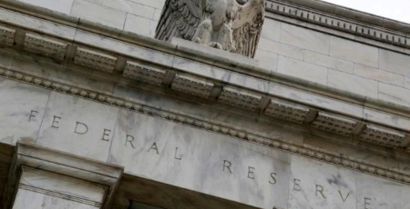 POLL-High risk of half-percentage-point Fed rate hike in 2022, economists say